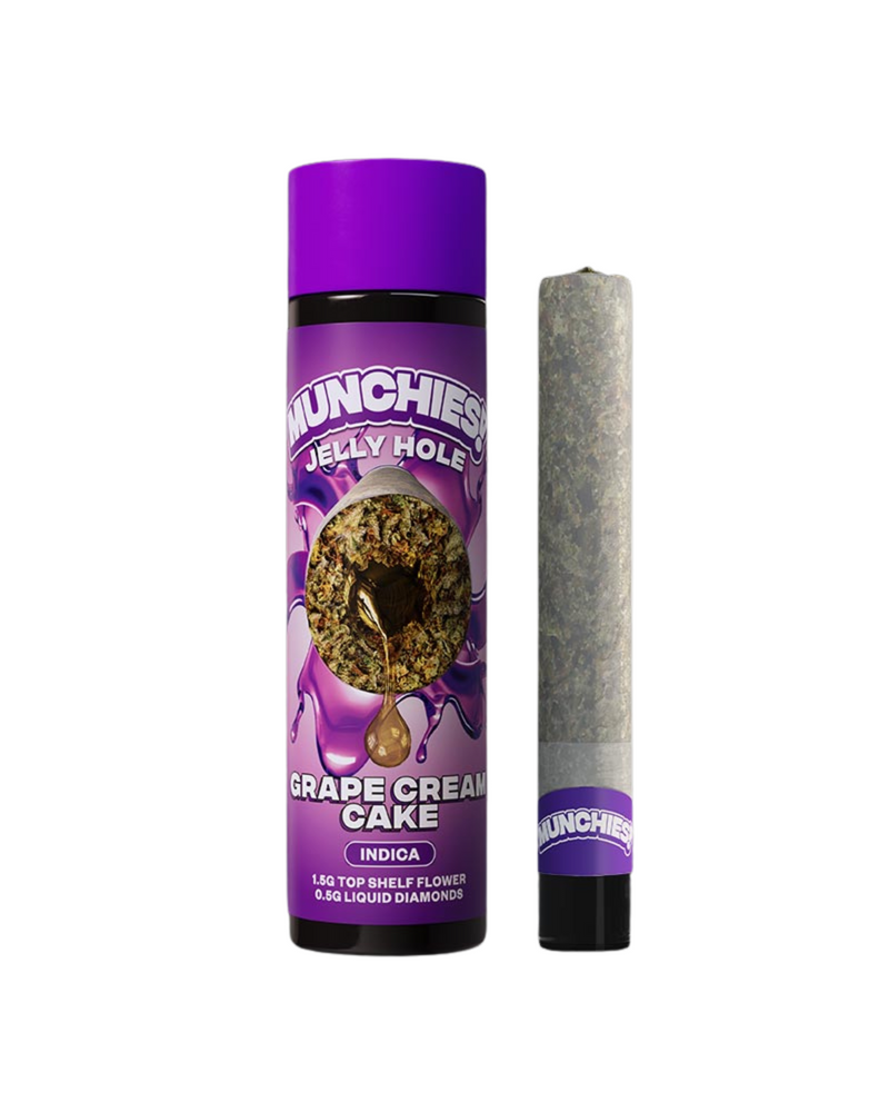 The Cannabis product labeled "Delta Munchies THCA Jelly Hole Pre-Rolls | 2g" features THCA Jelly Hole prerolls with a liquid diamond center for an elevated experience. The packaging shows a rolled cannabis joint and a cylindrical container with a purple cap.