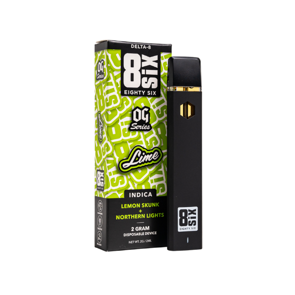 A black Eighty Six Delta 8 Disposable | 2g lies next to its green and black box labeled "Delta-8, Eighty Six Brand, Lemon Skunk, Northern Lights, Indica, 2 Gram." The box has a lime design and indicates it's an OG series product.