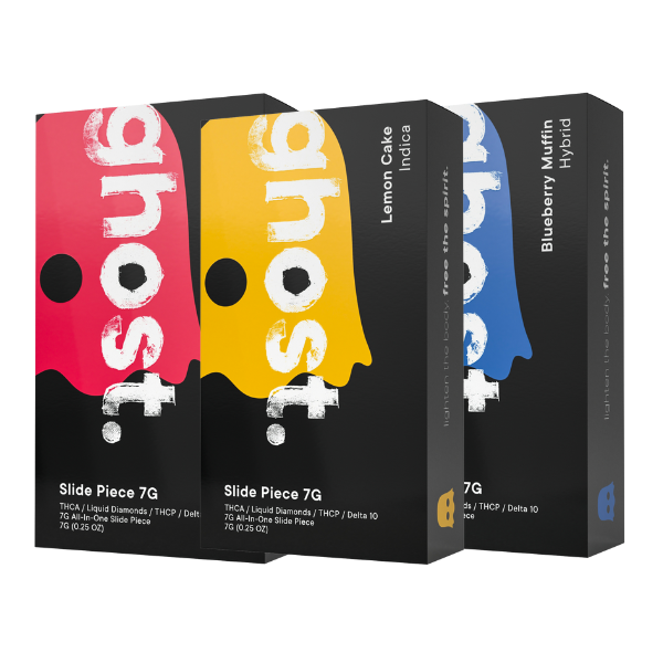 Three boxes of Ghost THCA Slide Piece Disposable | 7g products by Ghost in varying flavors: Lemon Cake (Indica), Blueberry Muffin (Hybrid), and an unnamed flavor, each containing 7 grams.