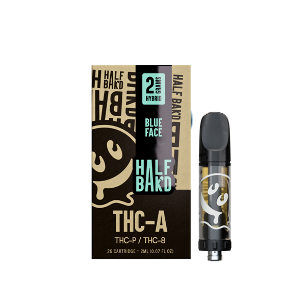 A black and gold Half Bak'd THC-A Cartridge | 2g with packaging labeled "Half Bak'd," "Blue Face," and "Hybrid." The packaging indicates it contains 2 grams of THC-A live resin and THC-P / THC-8, compatible with 510 vape batteries.