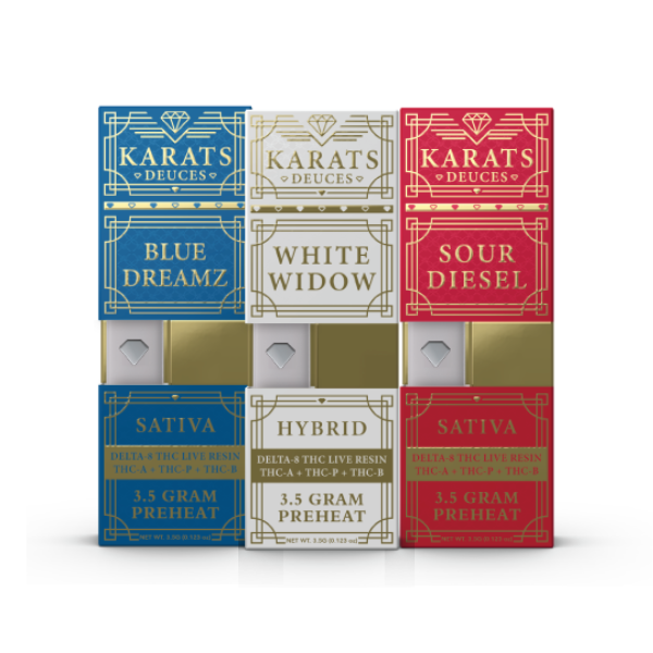 Three columns of Carats Karats Deuces Blend Pre-Heat Disposable | 3.5g boxes, with three boxes in each column. The boxes are labeled with various strains like "Blue Dreamz," "White Widow," and "Sour Diesel," featuring gold accents separating rows. Each box highlights live resin terpenes for a premium vaping experience.