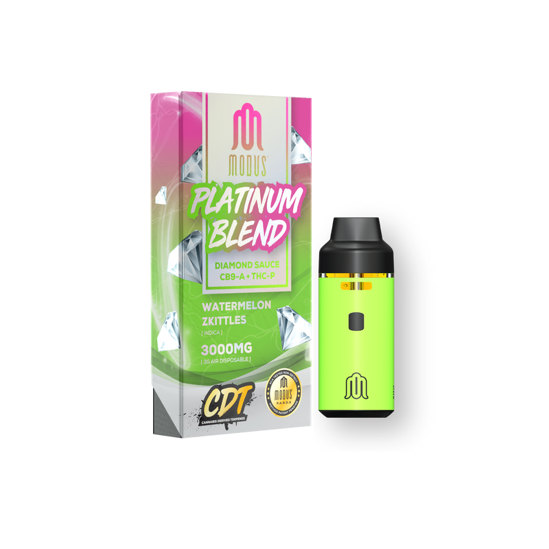 Image of a Modus Platinum Blend Disposable | 3g product with a box labeled "Watermelon Zkittles" and "3000MG." The device, part of the Modus Collection, is next to the box and is lime green with a black top.