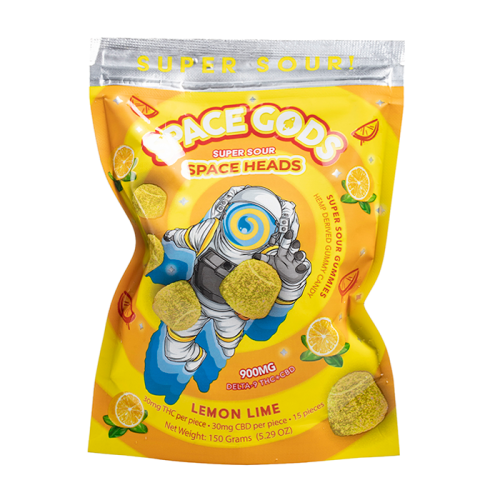 A bright yellow package of Space Gods Super Sour Space Heads Gummies | 900mg in lemon lime flavor featuring an astronaut graphic. Each piece contains 900 mg of delta-9 THC and 30 mg of CBD, with a total weight of 150 grams.