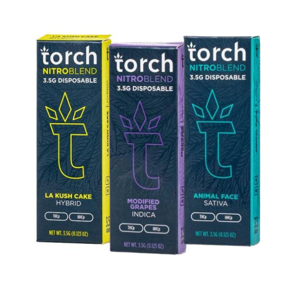 Three Torch Nitro Blend THC-A Disposables 3.5G vape packages from Torch. From left to right: La Kush Cake (Hybrid), Modified Grapes (Indica), and Animal Face (Sativa). Each package highlights the THC and HHC content, offering enhanced potency with THC-A for a unique experience.